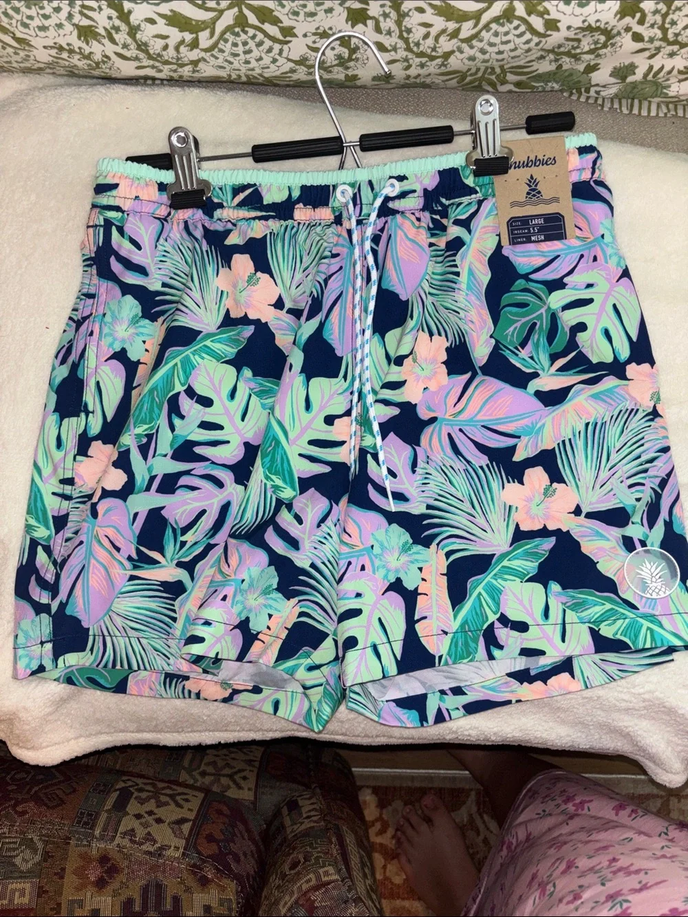 chubbies Navy Tropical Leaf Print Swim Trunks with Pastel Accents